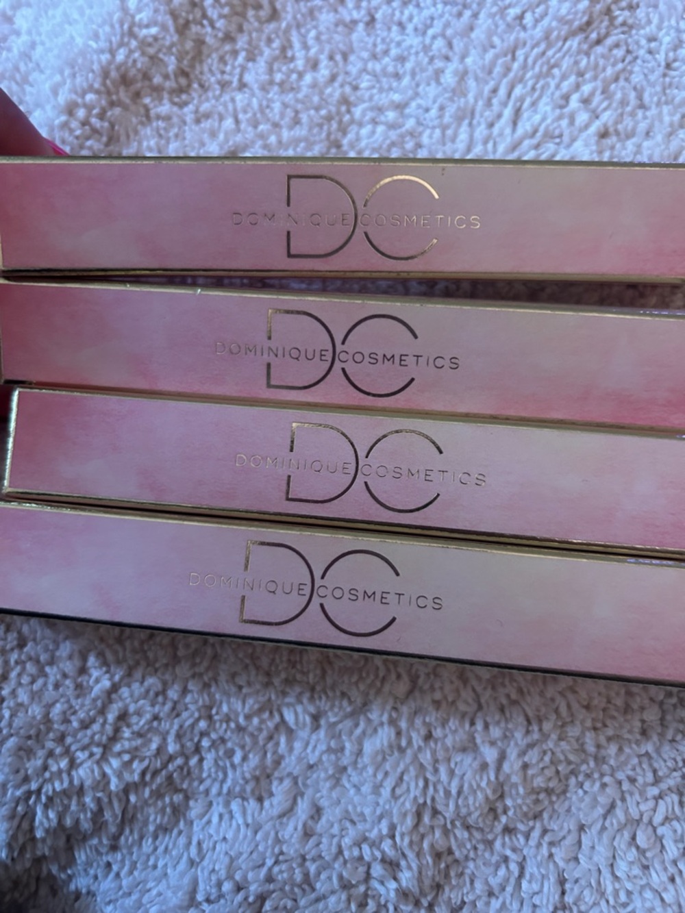4 Dominique Cosmetics Glosses;